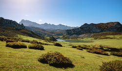 Valley with lake between mountains