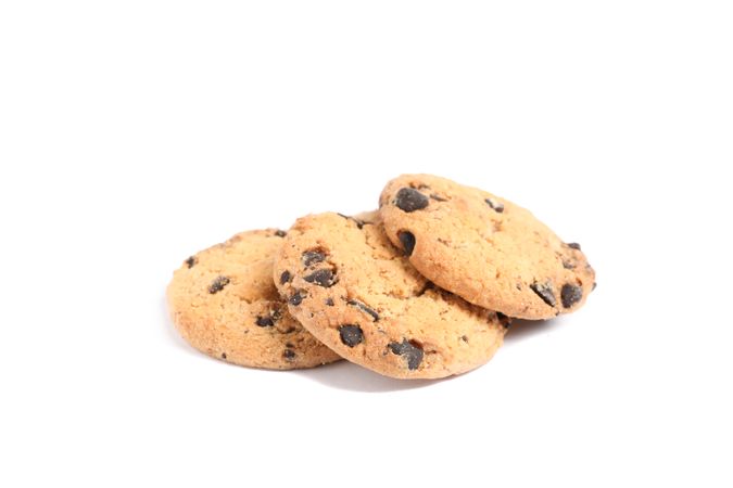 Delicious chocolate chip cookies on blank background