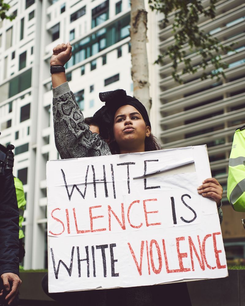 London, England, United Kingdom - June 6th, 2020: Woman holding sign at BLM protest