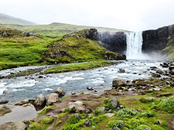 Majestic icelandic waterfall cascading over cliffs