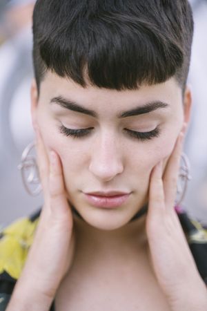 Woman looking deeply at camera
