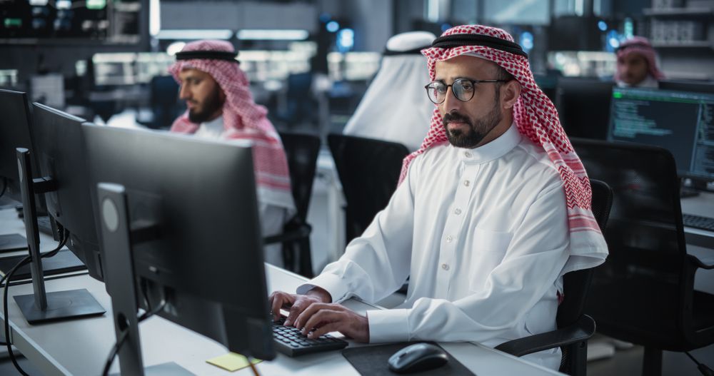 Young Gulf Man Developing Software for Generative AI Project