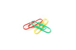 Color paper clips isolated on plain background