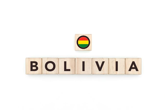 Wooden blocks bearing the name and flag of Bolivia.
