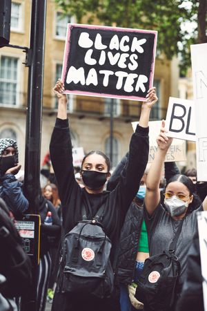 London, England, United Kingdom - June 6th, 2020: Young women with Black Lives Matter signs
