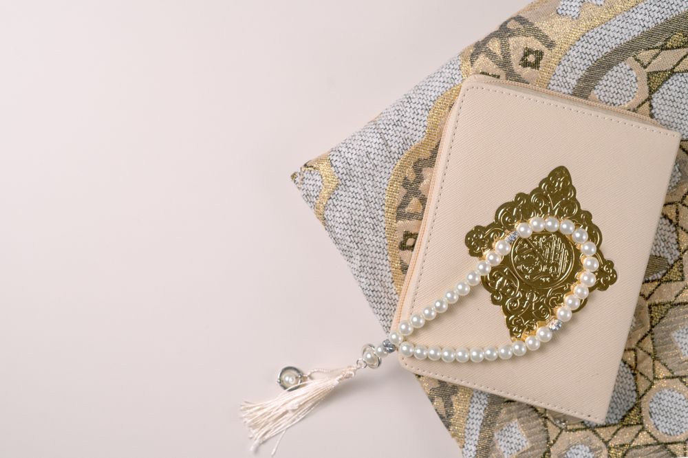 Elegant Prayer Book with Pearls and Intricate Islamic Design