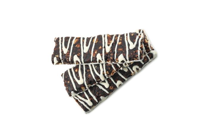 Tasty granola bars isolated on blank background