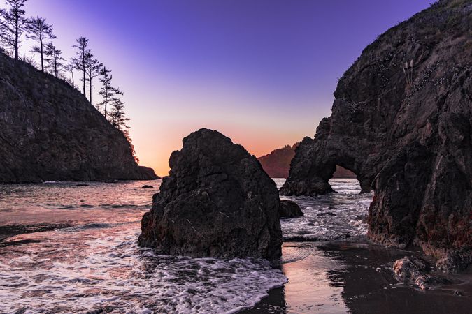 The coast at sunset with beautiful purple orange sky