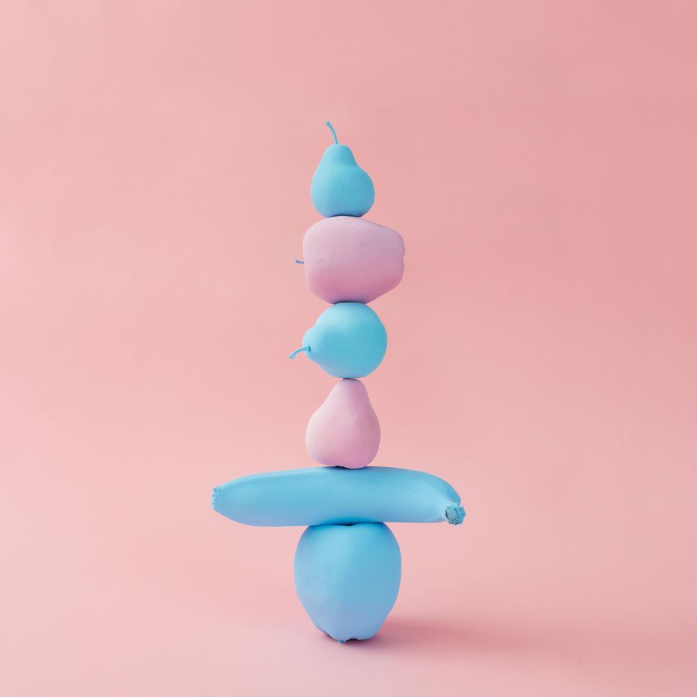 Stacked painted pink and blue fruits