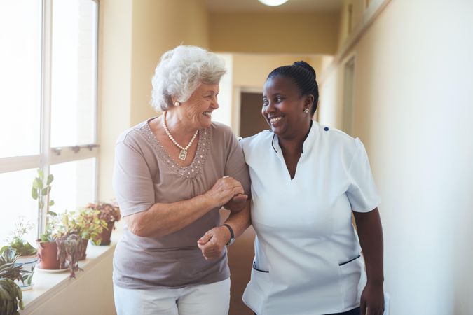 Healthcare worker taking care of mature woman