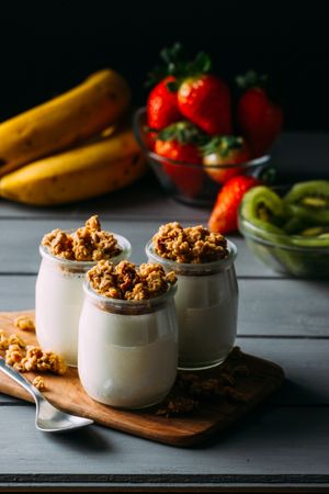 Glass bottles with milk and walnuts