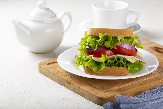 Natural sandwich. Sandwich with cheese, ham, lettuce, tomato and red onion.