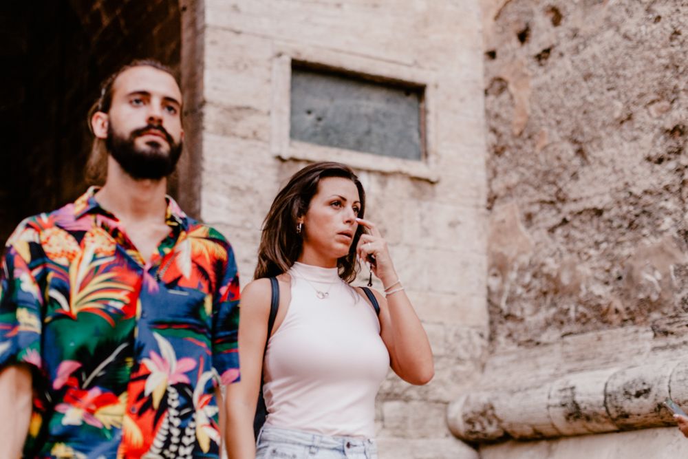Casual young couple strolling in ancient town
