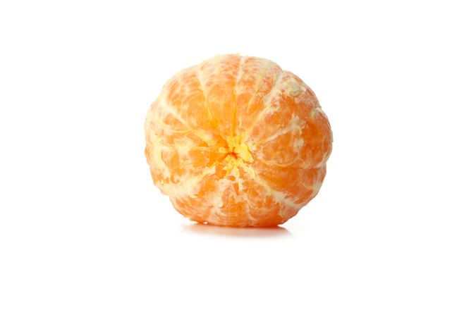 Ripe one mandarin isolated on light background
