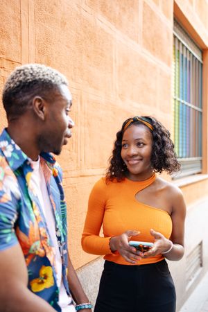 Young Black friends walking in the street