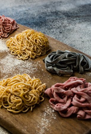 Cooking concept with variety of homemade pasta