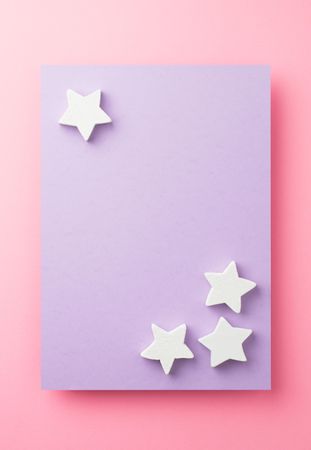 Light stars on purple and pink background