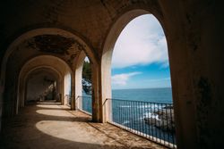 Historic dome next to the shoreline overlooking the water
