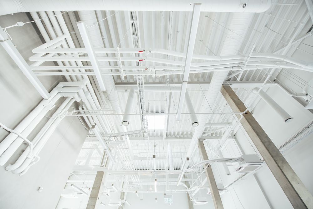 pipes and cables in industrial building