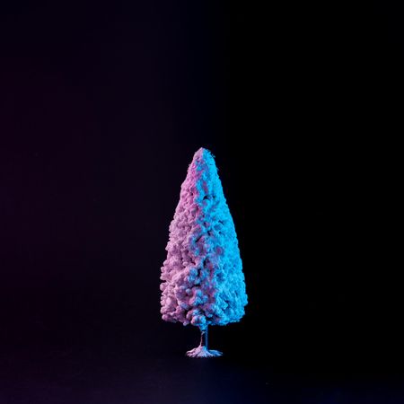Snowy Christmas tree in vibrant bold gradient holographic colors