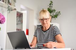 Woman buying online with credit card