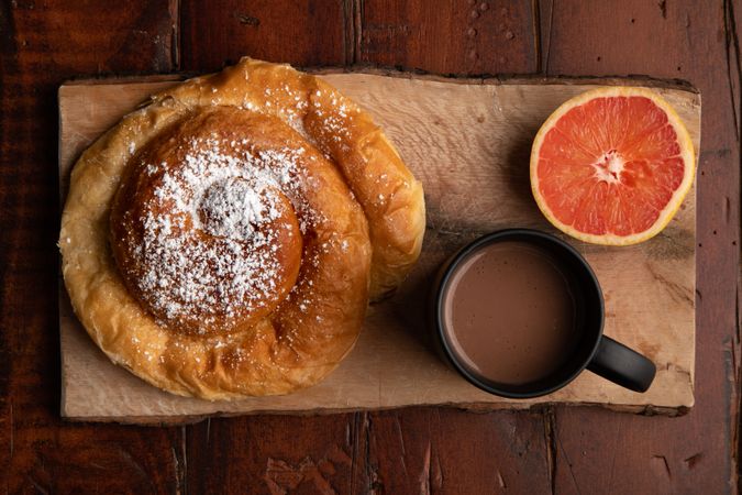 Breakfast food and drink on wooden table
