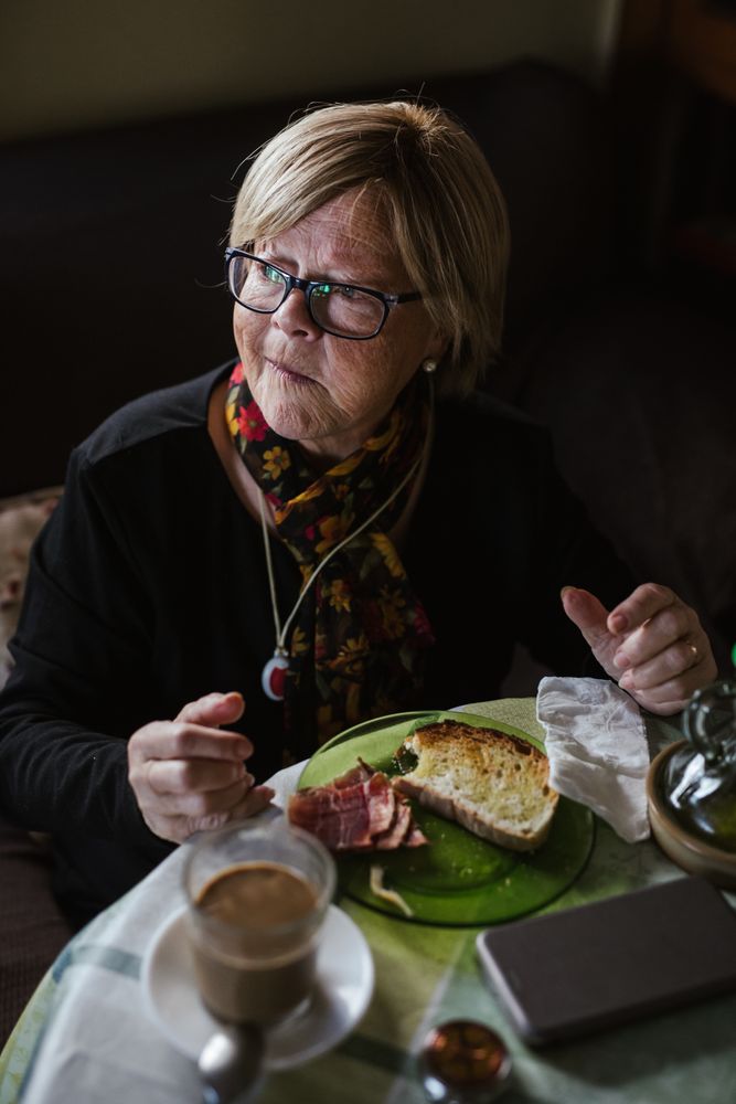 Older woman having breakfast