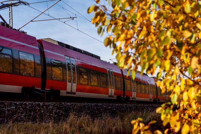 Nuremberg commuter train traveling through autum nature
