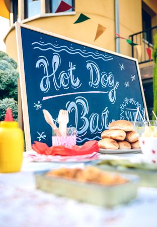 Chalkboard over table with food and drinks in party