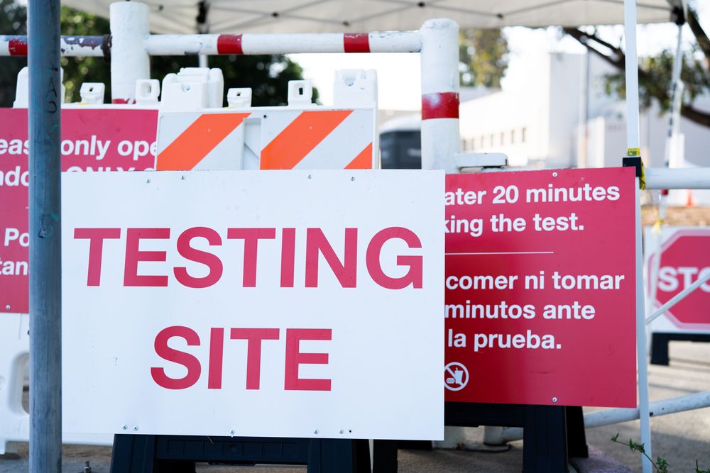 Signs at entry of Covid testing site
