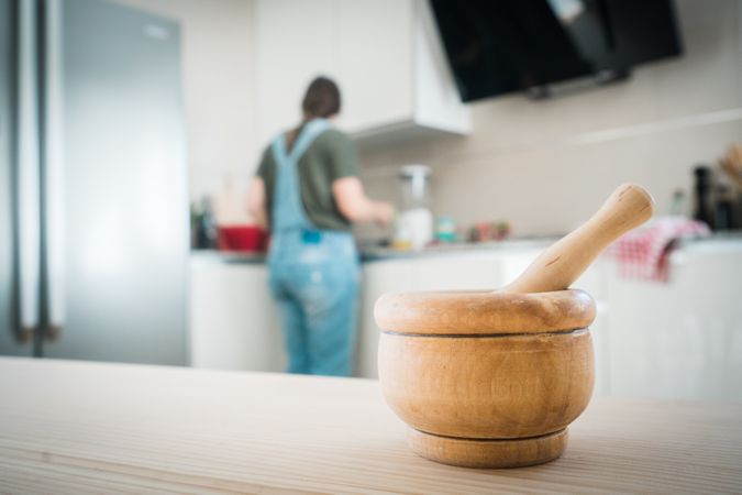 Mortar and pestle on table in kitchen