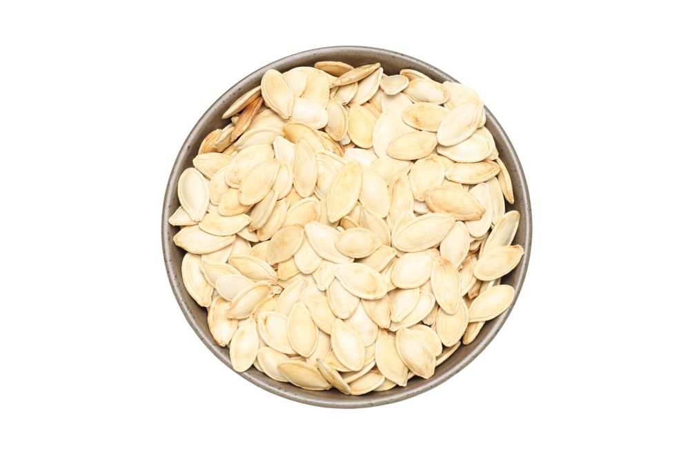 Concept of Autumn vibe food, Pumpkin, Pumpkin seeds, isolated on light background