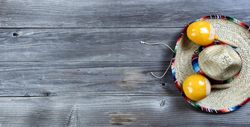 Cinco De Mayo with traditional Mexican objects on rustic wood