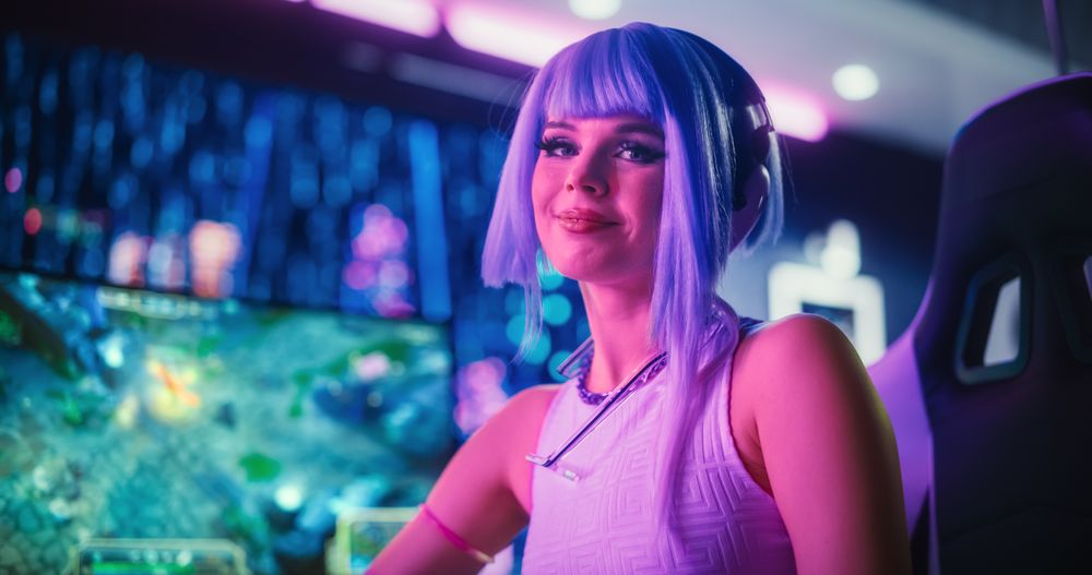 Portrait of a Stylish Cyberpunk Cosplay Content Creator with Blue Hair Posing in Front of Camera, Smiling.