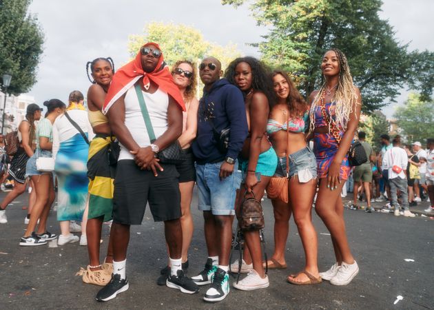 London, England, United Kingdom - August 28, 2022: Group of friends dressed for London street party