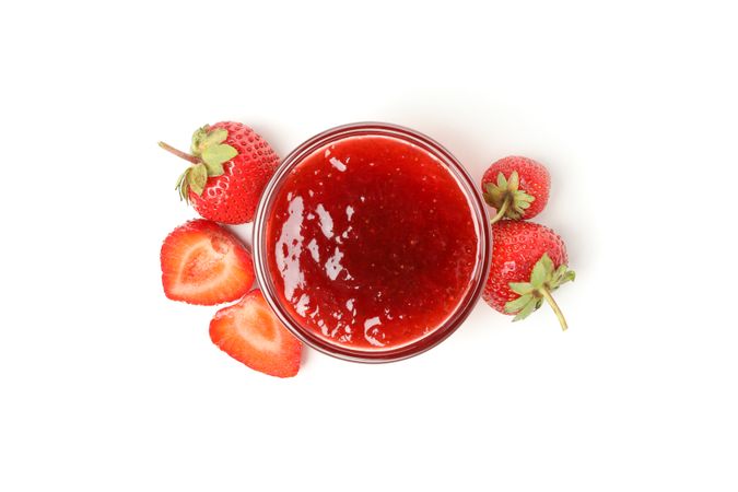 Delicious strawberry jam isolated on blank background