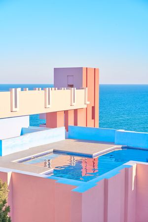 Compact pool on roof of building of geometric shapes