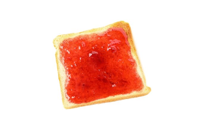 Toast with strawberry jam isolated on plain background