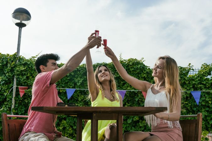 Group of friends drinking sangria on the terrace
