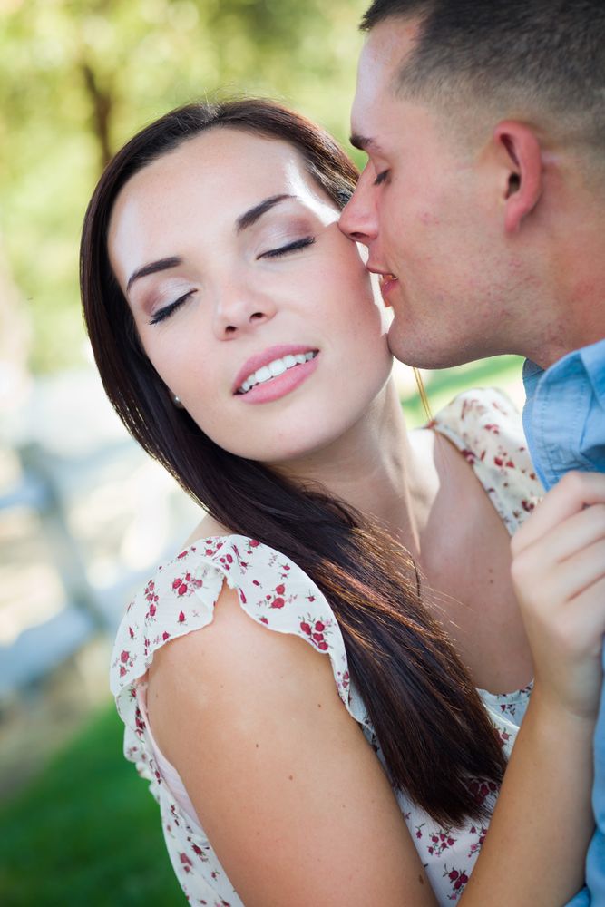 Affectionate Couple Portrait in the Park.