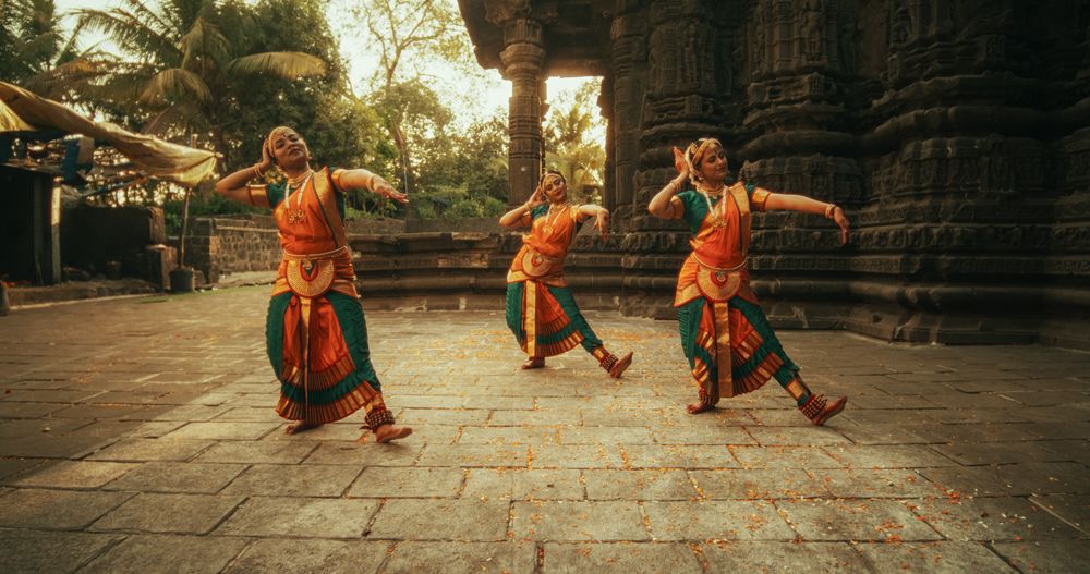 Closeup Portrait of an Energetic Indian Woman in Traditional Attire Dancing Bharatanatyam with Expressive Face and Swift Moves.