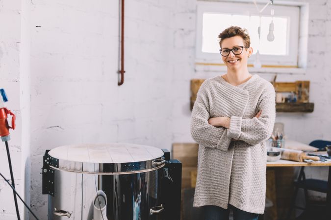 Confident potter in workshop