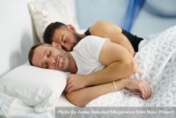 Cute male sleeping and holding each other in bed 4dvXE0