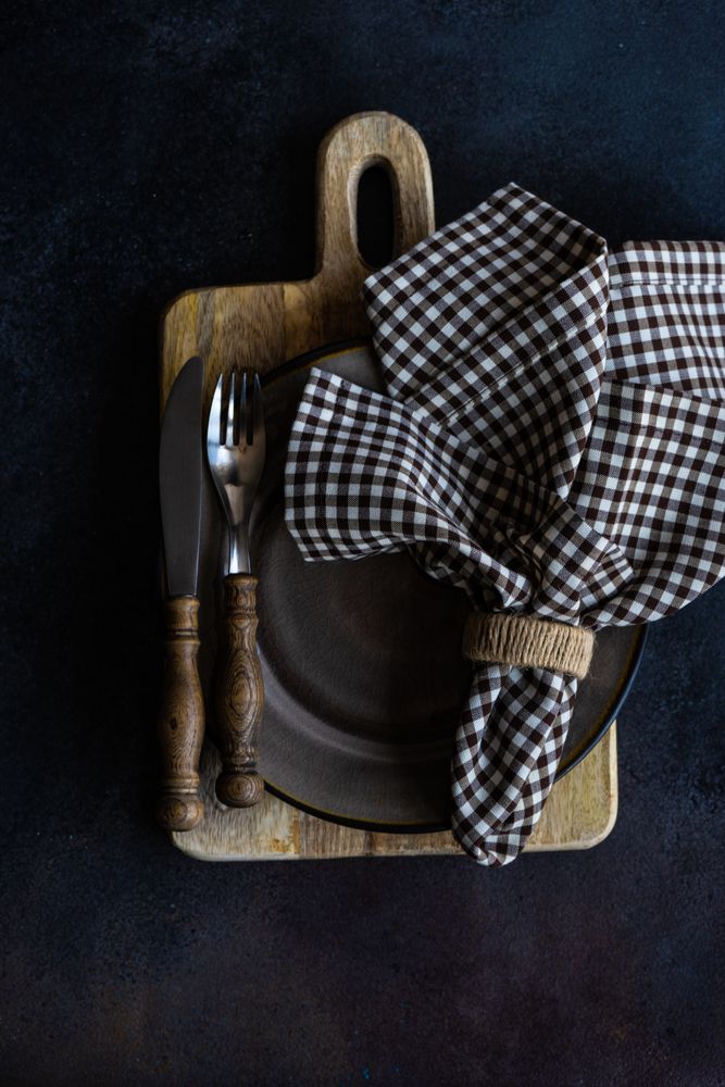 Top view of grey rustic table setting