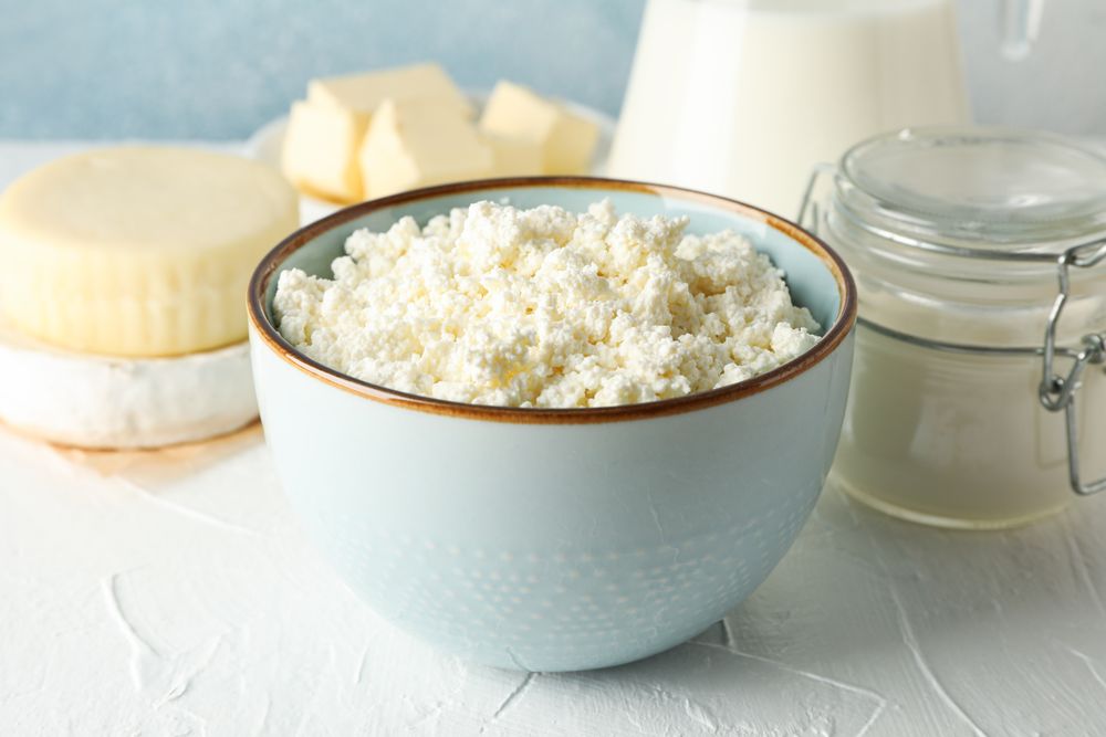 Different dairy products on background, close up
