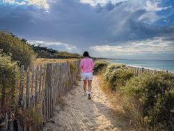 Walking the coastal path at dawn, La Couarde sur Mer, France