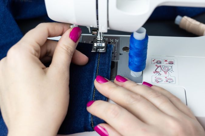 Woman sewing pants