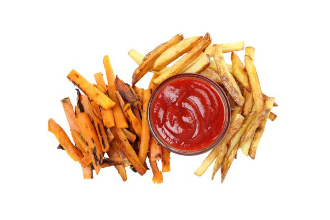 fried sweet potato with sauces, isolated on light background