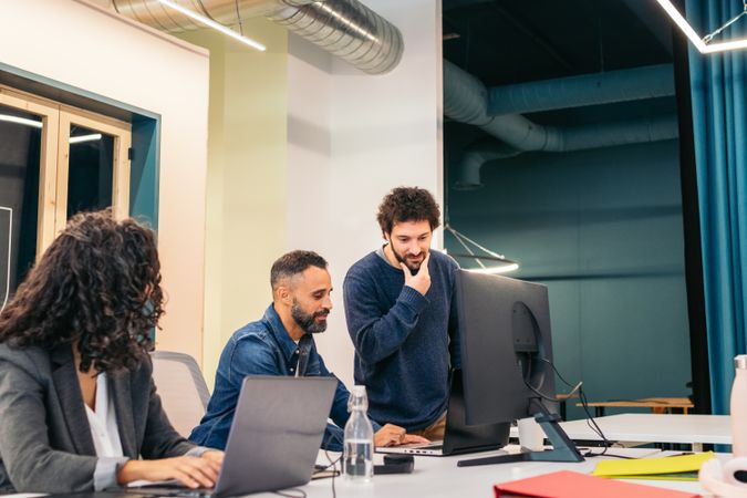 Group of people working with laptop in a coworking