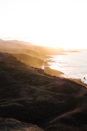 Sunrise over rugged coast